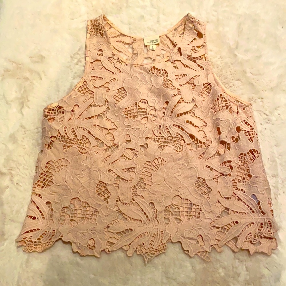 Caution to the wind tank. Size small